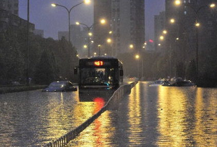 bus stuck in a rain flood in kunming yunnan china