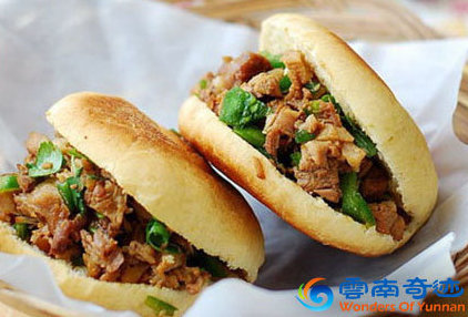 chinese hamburger or roujiamo, bread filled with minced meat and peppers