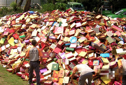 Big pile of mooncake gift boxes waste due to overpackaging