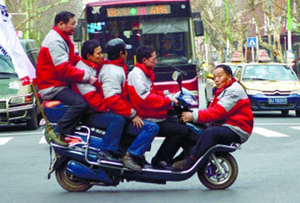 five people on one scooter china asia