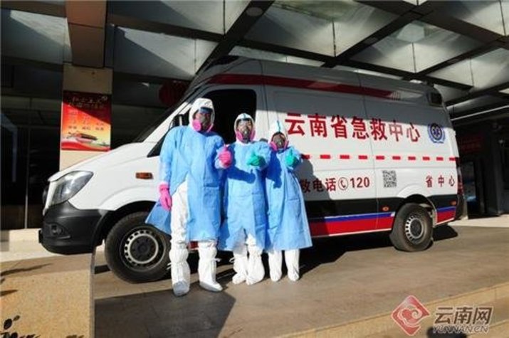 coronavirus china yunnan province medical staff poses in front of yunnan ambulance ready to take virus patients